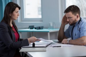 Image of female lawyer in doctor's office