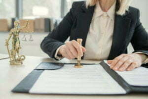 female lawyer stamping document 2021 09 24 03 43 51 utc