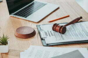clipboard with compensation claim form and gavel l 2021 08 31 14 46 59 utc
