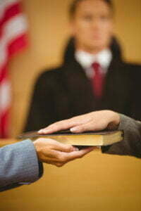 10 Benefits in Hiring an Expert Witness You Should Know 3 16683498 witness swearing on the bible telling the truth 1