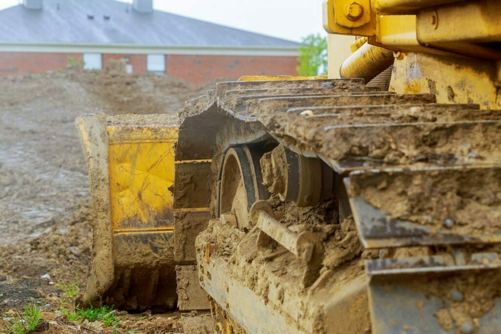 The Danger of Working Near Water with Heavy Equipment 2 digger heavy duty construction equipment parked a 2022 11 12 11 20 41 utc