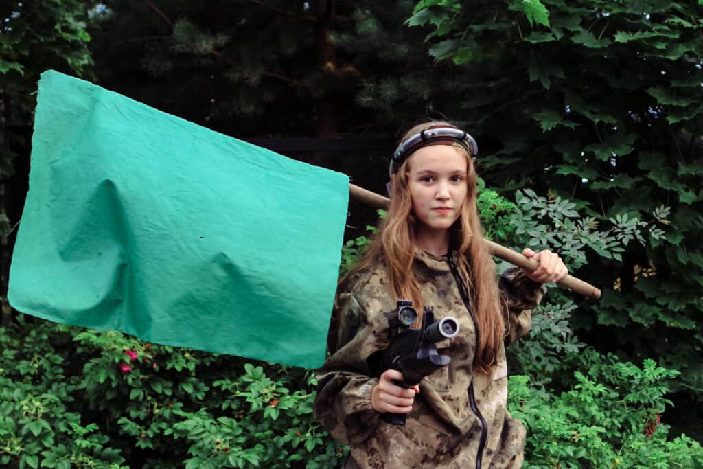 How Can a Laser Tag Injury Be Covered Under Workers' Compensation? 2 teenage girl playing in lasertag shooting game in 2022 11 14 03 10 26 utc