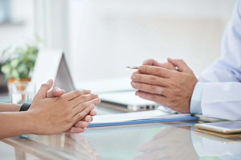 When a Workplace Injury Leads to Surgery 2 talking with doctor 2021 08 26 19 52 51 utc